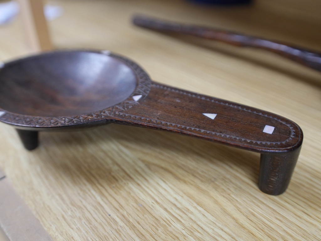 A Fijian throwing club, ula, and Fijian Kava oil bowl with mother of pearl inlay, largest 38cm in length. Condition - good